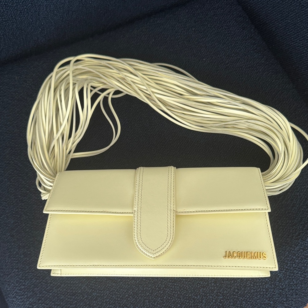 Jacquemus Le bambino long ficiu light yellow shoulder bag with Strap Detail